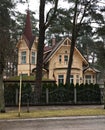 Architecture of houses built of wood, snowy, resort city of Jurmala. Latvia, spring 2018 Royalty Free Stock Photo