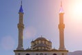 Architecture of the Islamic mosque in Turkey against the sunny blue sky. Byzantine style Muslim mosque. Royalty Free Stock Photo