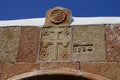 Historical decor adorns the outer wall of St. Mary\'s Church. Rhodes Island, Dodecanese, Greece