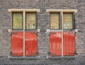 The architecture of medieval Europe is old windows and doors, stained glass and bars. The Hague. The Netherlands. Royalty Free Stock Photo