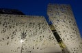 Architecture at night of the facade of Palazzo Italia