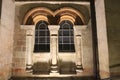 The architecture of the old building in the shadows of the night lights.