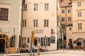 The architecture of the old city of Prague. Old cozy streets. Cafe with summer areas where people relax