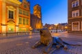 Architecture of the old town of Gdansk with bronze lions statues - emblem of the city, Poland Royalty Free Stock Photo