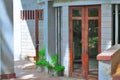 Architecture outdoor exterior modern design. Wooden door and window on cement concrete wall background. Zinda Park, Bangladesh