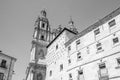 Architecture in Salamanca, Spain; view of the Casa de las Conchas and a Baroque church in the background Royalty Free Stock Photo