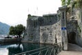 architecture of side entrance fortifications and lake of Old Town of Kotor, Montenegro. Beautiful narrow streets, entrance to the