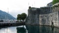 architecture of side entrance fortifications and lake of Old Town of Kotor, Montenegro. Beautiful narrow streets, entrance to the