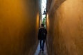 The architecture of the strago city of Prague. The narrowest street in Europe. The passage between buildings for one person, Royalty Free Stock Photo