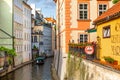 The architecture of the strago city of Prague. River channel in the city. Streets of old Europe, cityscape