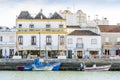 Architecture of Tavira with boats on Gilao river, Algarve, Portugal