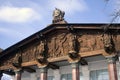 Architecture of VDNKH park in Moscow. A pavilion decorated by wooden sculptures