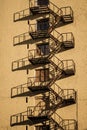 Architecture white high rise office building with shadow of metal fire escape Royalty Free Stock Photo