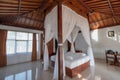 Architecture wooden bedroom balinese style with curtain of tropical villa Royalty Free Stock Photo