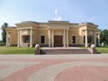 Architecture yellow building with columns entrance stairs Royalty Free Stock Photo