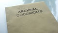 Archival document, folder with important documents lying on table, close up Royalty Free Stock Photo