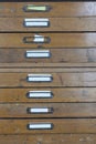 Archive with many vintage wooden drawers