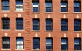 Archstones Over Windows in Traditional Brick Building Royalty Free Stock Photo