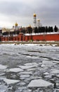 Archtecture of Moscow Kremlin. Color wnter photo, frozen Moscow river at foreground