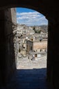 Archway alley with stairs in the old town of Matera