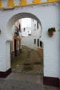 Archway at picturesque street Olvera Royalty Free Stock Photo