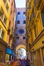 Crowded main street Clock tower archway Venice Italy Royalty Free Stock Photo