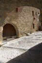 Archways on Plaza Mayor, in Ainsa, Huesca, Spain in Pyrenees Mountains, an old walled town with hilltop views of Cinca and Ara Riv Royalty Free Stock Photo