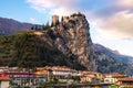 Arco city with castle on rocky cliff in Trentino Alto adige - province of Trento - Italy landmarks Royalty Free Stock Photo