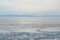 Arctic landscape with frozen lake in freezing-over time