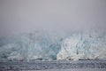 Arctic landscape - huge glacier in the fog