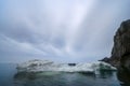 Arctic landscape with a whaleboat among the ice floes in the Bering Strait Royalty Free Stock Photo