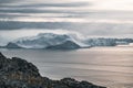 Arctic nature landscape with icebergs in Greenland icefjord. During midnight when sunset and sunrise meet in the horizon