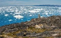 Arctic nature landscape with icebergs in Greenland icefjord. View from a nearby hill, overlooking icebergs from Jakobshavn Glacie Royalty Free Stock Photo