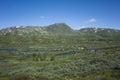 Arctic nature of Scandinavia in warm summer sunny day with blue sky. Unna Allakas mountain Royalty Free Stock Photo