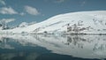 Arctic seascape at snow covered mount aerial. Climate change, global warm, melt icebergs