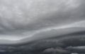 Arcus cloud rolling in the storm, Cumulonimbus cloud formations on tropical sky , Nimbus moving Royalty Free Stock Photo