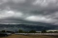 Arcus cloud or shelf cloud before rain storm Royalty Free Stock Photo