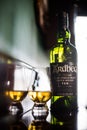 Ardbeg single malt whisky bottle and a Glencairn glass