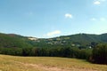 Ardennes of Luxembourg: Green nature with village in background Royalty Free Stock Photo