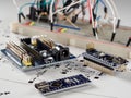 Arduino and programmers with peripherals and expansion boards lie on a gray background. do it yourself.Arduino micro.Arduino macro