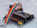 Arduino and programmers with peripherals and expansion boards lie on a gray background. do it yourself.Arduino micro.Arduino macro
