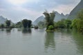 Li river runs through the fairy karst landscape of Yangshuo in Guangxi Zhuang Autonomous Region in China. Royalty Free Stock Photo