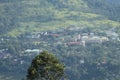 An area with buildings which is seen into the mountain