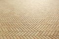 Area of ceramic bricks herringbone pattern