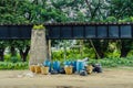 The area that dumped garbage under The Bridge of the River Kwai in Kanchanaburi, Thailand. pollution garbage waste, lots of junk