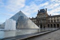 The area in front of the Louvre, summer morning.