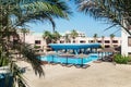Area hotel with pool and palm trees in Hurghada. Egypt. Royalty Free Stock Photo