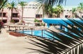 Area hotel with pool and palm trees in Hurghada. Egypt. Royalty Free Stock Photo