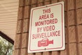 this area is monitored by video surveillance writing caption text rectangle sign Royalty Free Stock Photo