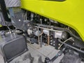 the area where the engine of a tractor is located. Details of a tractor Royalty Free Stock Photo